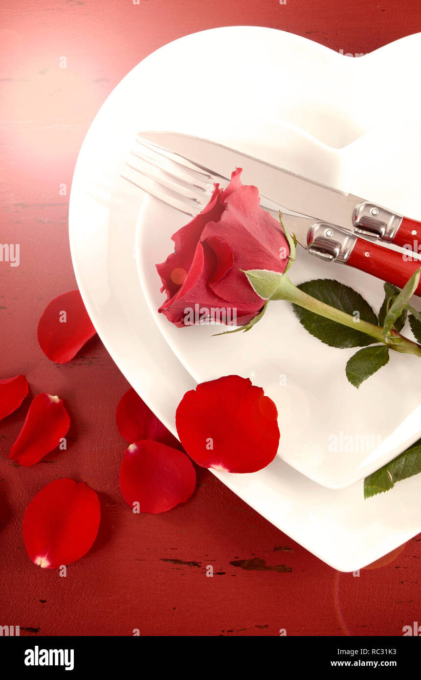 Happy Valentine's Day table place setting on red vintage wood ...