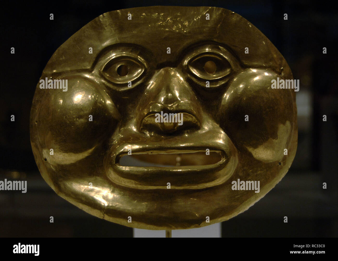 Pre-Columbian Art. Colombia. Calima (LLama) culture. Gold funerary mask. 5th–1st century BCE. Metropolitan Museum of Art. New York. United States. Stock Photo