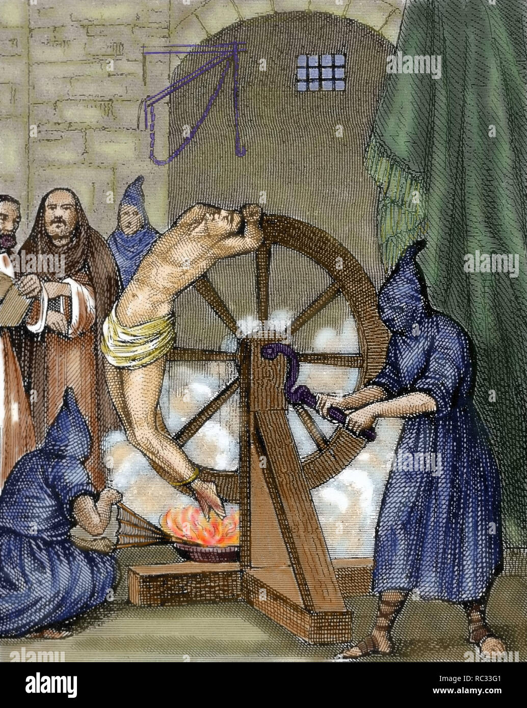Inquisition. Instrument of torture. Wheel of Fortune. Colored engraving. Stock Photo