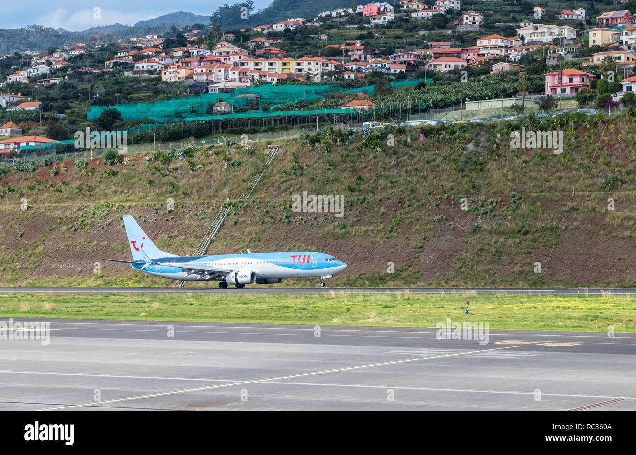 TUI Boeing G-FDZU 737-800 landing at Madeira International Airport Cristiano Ronaldo CR7 Stock Photo