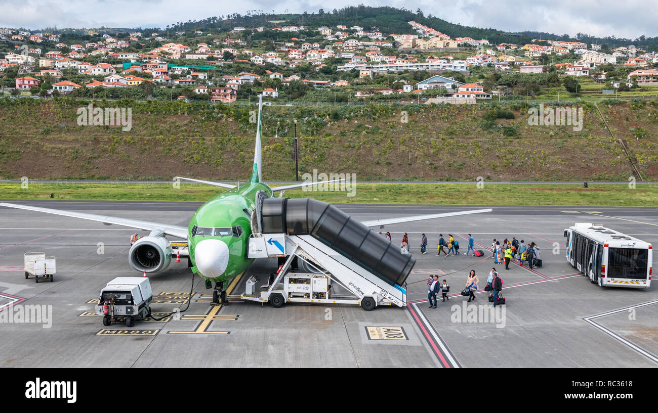 Passengers boarding D-AGER Germania Boeing 737-700 at Madeira International Airport Cristiano Ronaldo CR7 Stock Photo