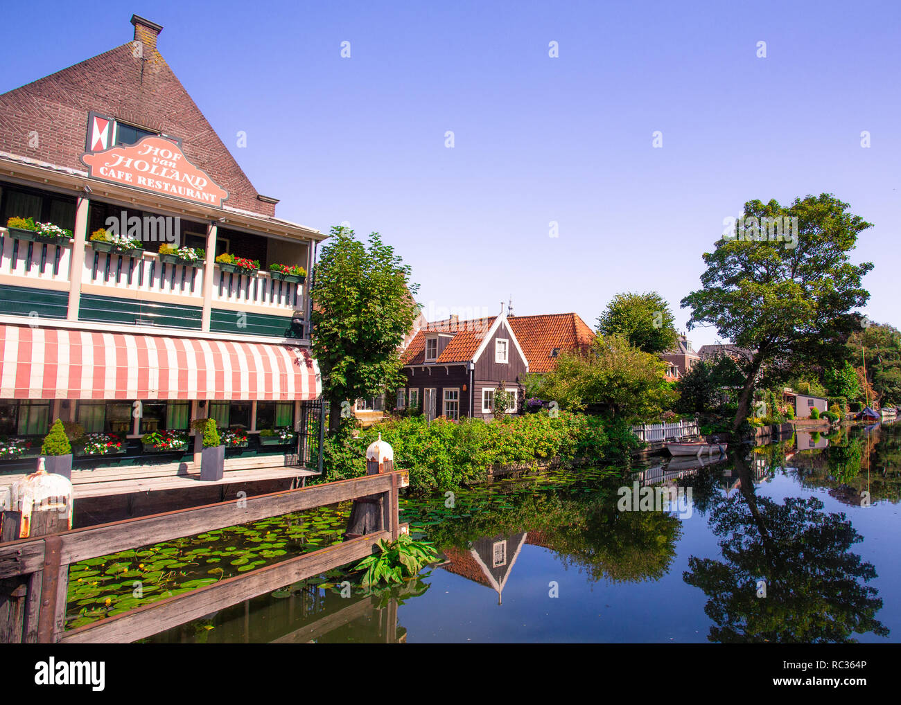 Scene from picturesque cheese-making town of Edam, Holland with historic architecture and canal Stock Photo