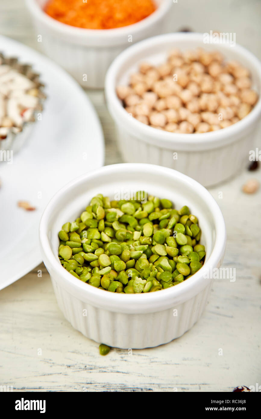 Bowls of various legumes red turkish lentils, chickpeas, beans, peanuts