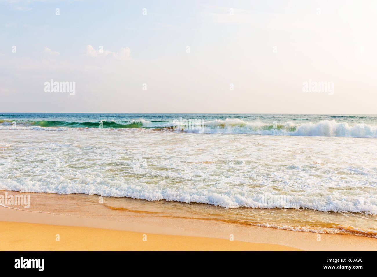 Landscape of sand beach and sea with blue sky Stock Photo - Alamy
