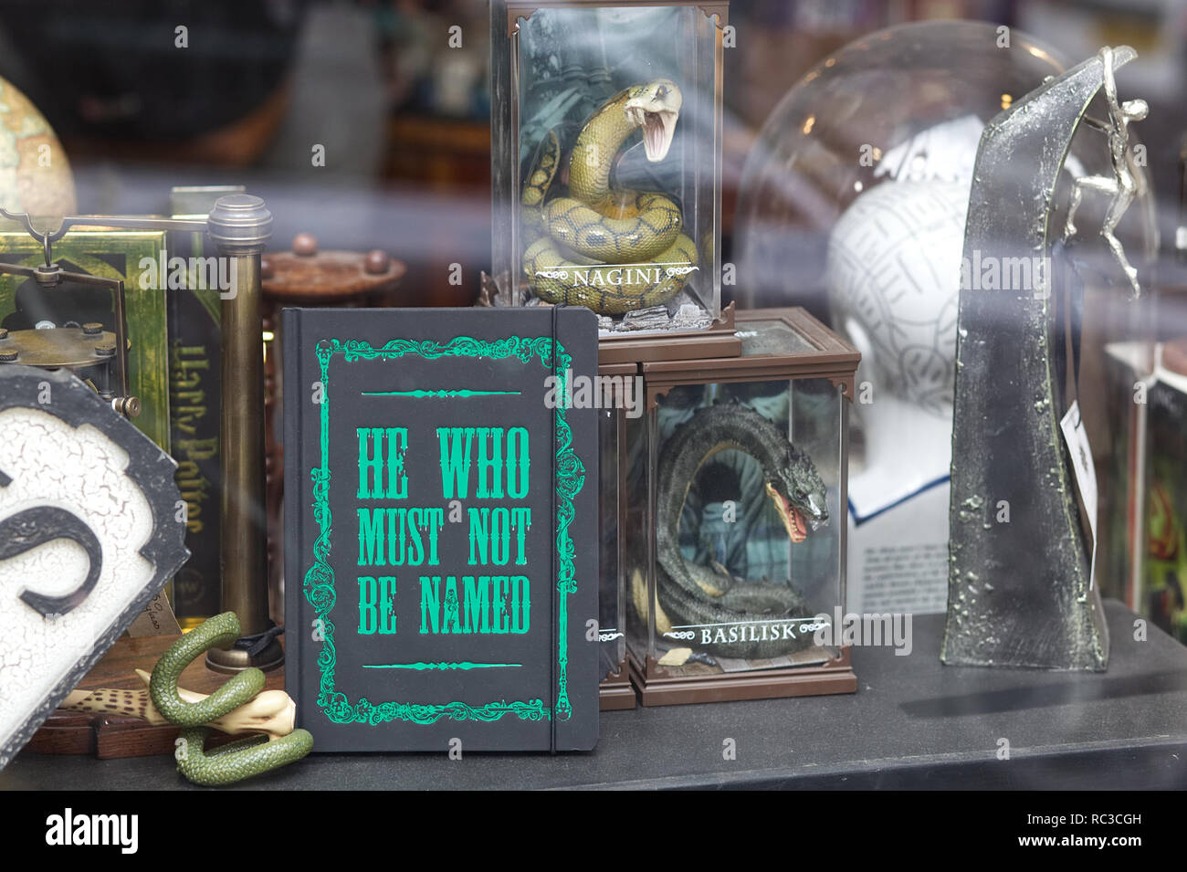 https://c8.alamy.com/comp/RC3CGH/nagini-and-the-basilisk-with-he-who-must-not-be-named-book-from-harry-potter-in-a-shop-window-RC3CGH.jpg