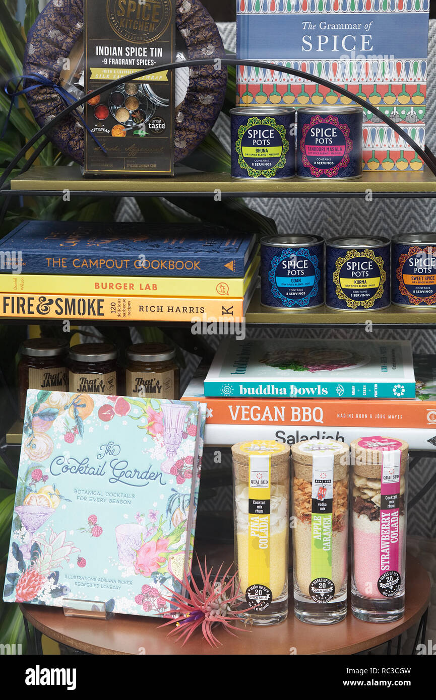 Vegan and Buddha camp out cook books with spice pots Stock Photo