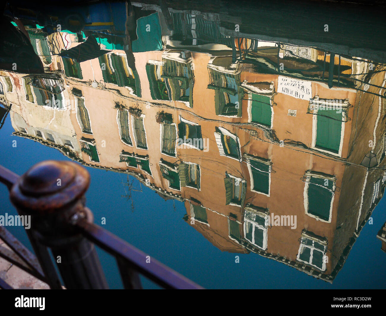 Reflections in the water of a canal, Venice, Veneto, Italy Stock Photo ...