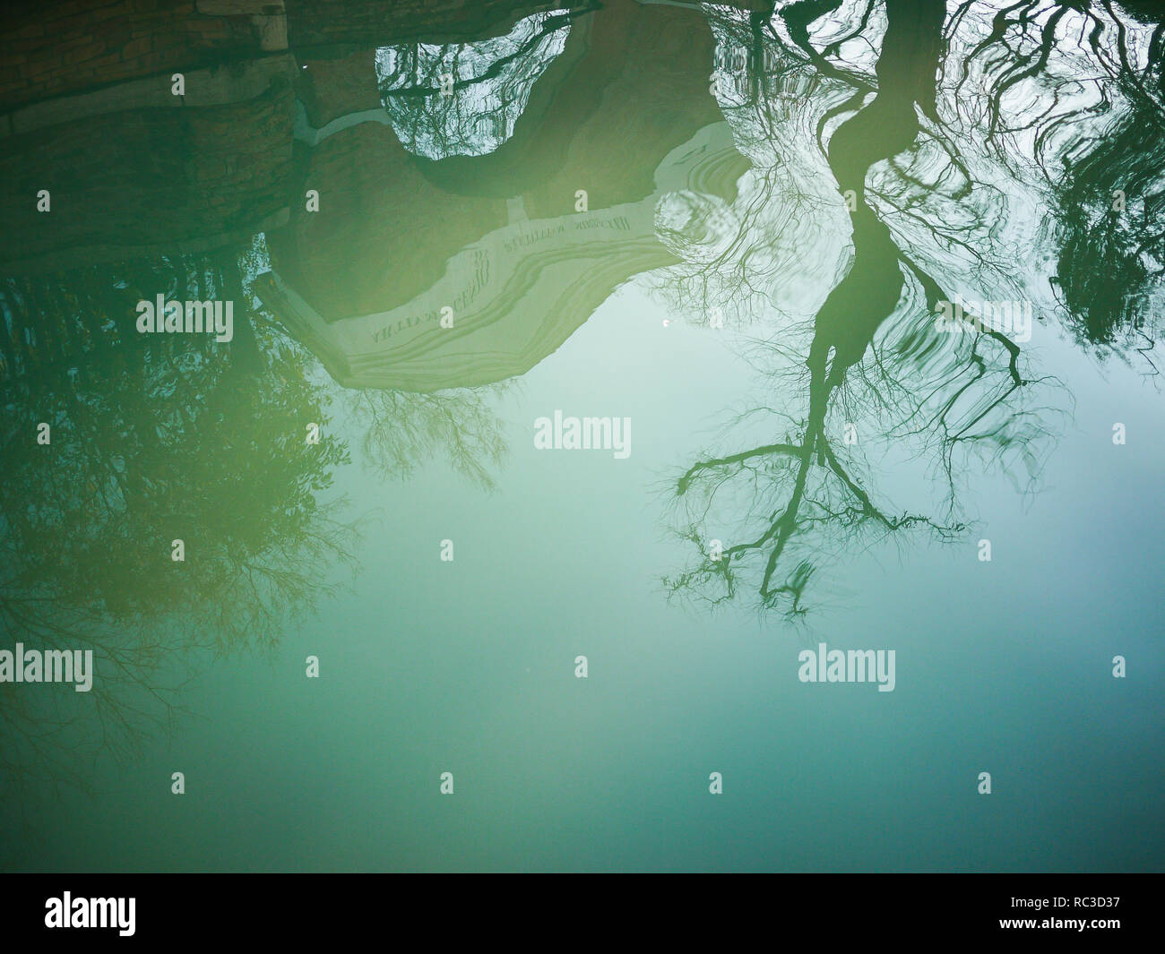 Reflections in the water of a canal, Venice, Veneto, Italy Stock Photo ...