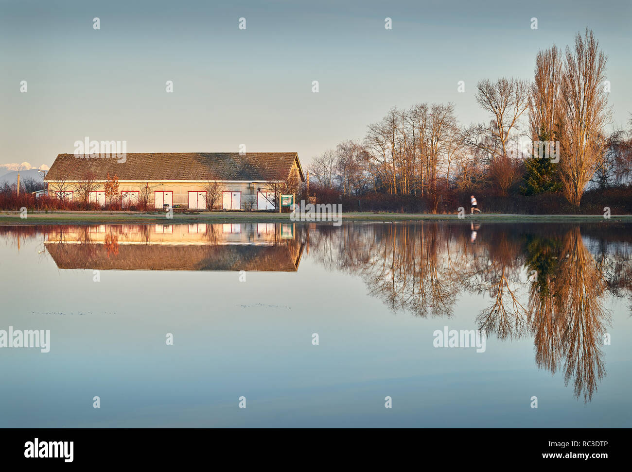 Garry Point Pond Reflection, Richmond. The historic net shed at Garry Point, Steveston. Richmond, BC. Stock Photo