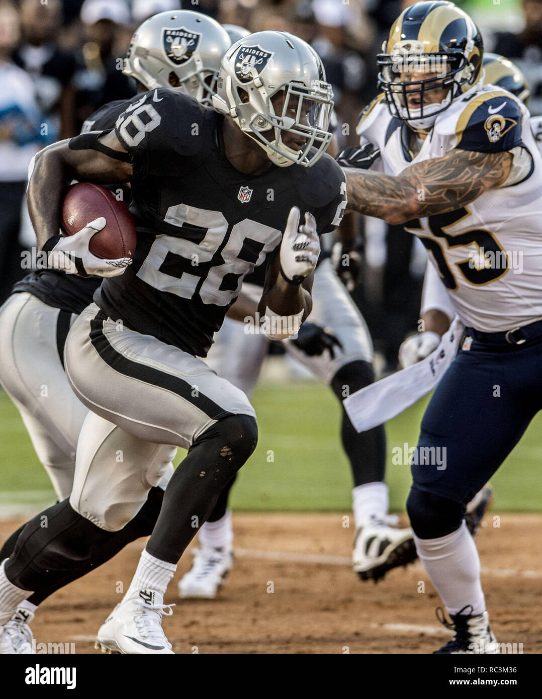 Oakland, California, USA. 14th Aug, 2015. Oakland Raiders new head coach  Jack Del Rio with quarterback Derek Carr (4) during pregame warm-ups on  Friday, August 14, 2015, in Oakland, California. The Raiders