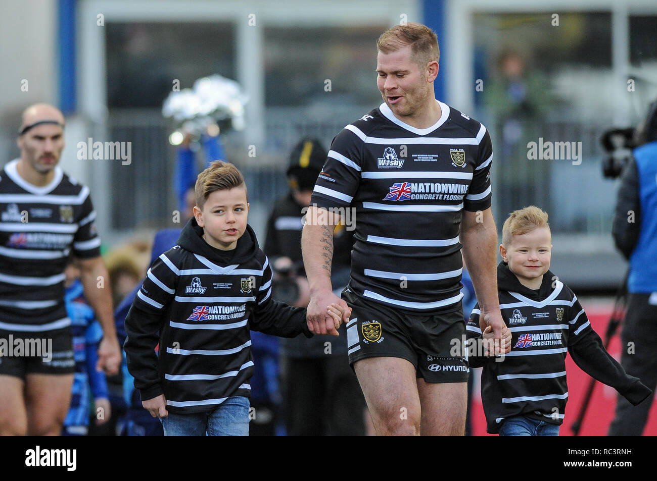 Wakefield, UK. 13 January 2019. Mobile Rocket Stadium, Wakefield, England; Rugby League Danny Kirmond and Danny Washbrook Testamonial, Wakefield Trinity vs Hull FC; Hull FC's Danny Washbrook leads out his teammates during his joint testimonial with Wakefield Trinity's Danny Kirmond. Credit: Dean Williams/Alamy Live News Stock Photo