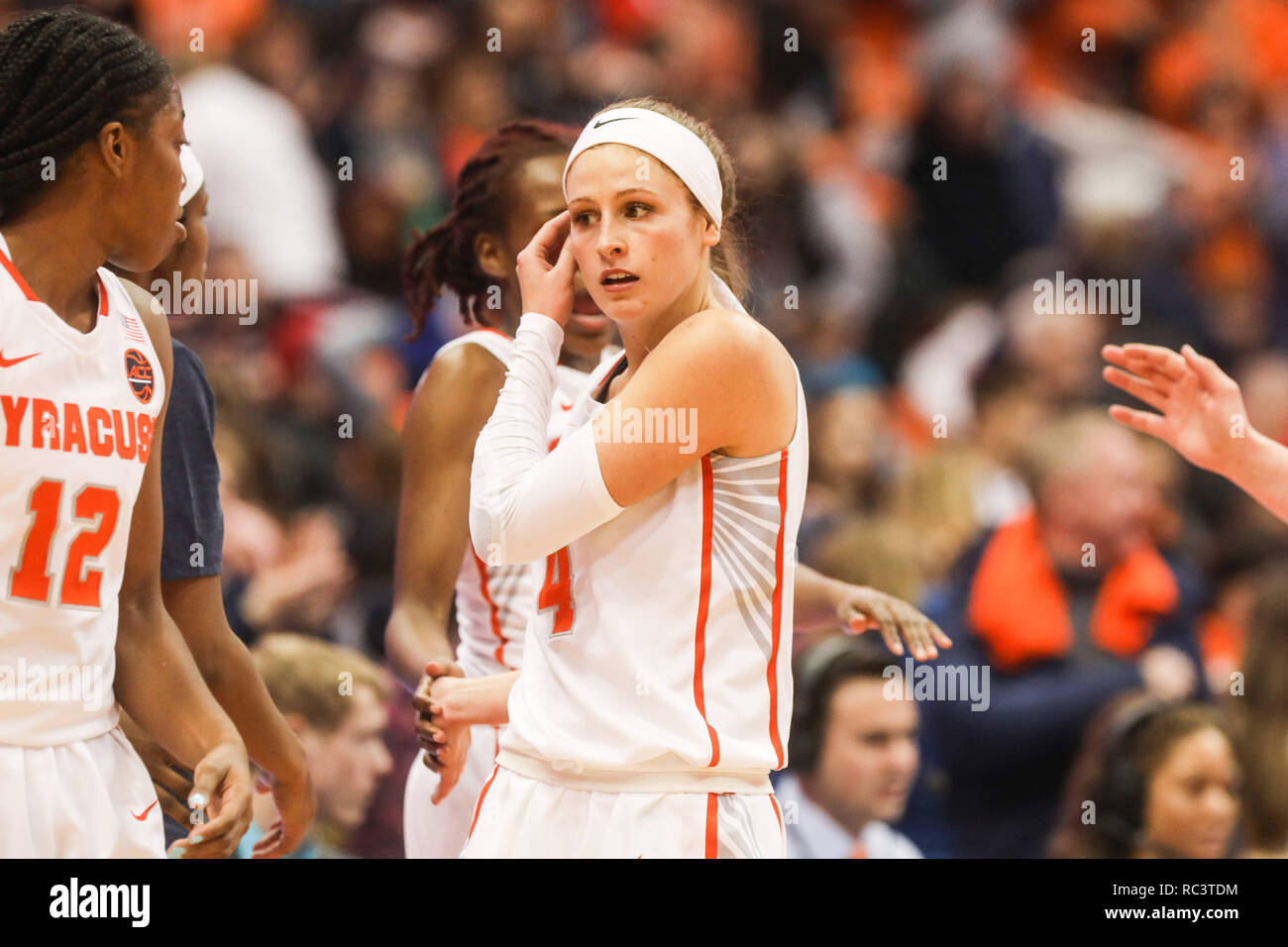 Syracuse, New York, USA. 13th Jan, 2019. January 13, 2019 : Syracuse's Tiana Mangakahia (4) celebrates with her teammates after scoring 34 points of the day during the NCAA basketball matchup between the Syracuse Orangewomen and University of North Carolina Lady Tar Heels at the Carrier Dome in Syracuse, New York. Syracuse defeated North Carolina 90-77. Nick Serrata/Eclipse Sportswire/CSM/Alamy Live News Stock Photo