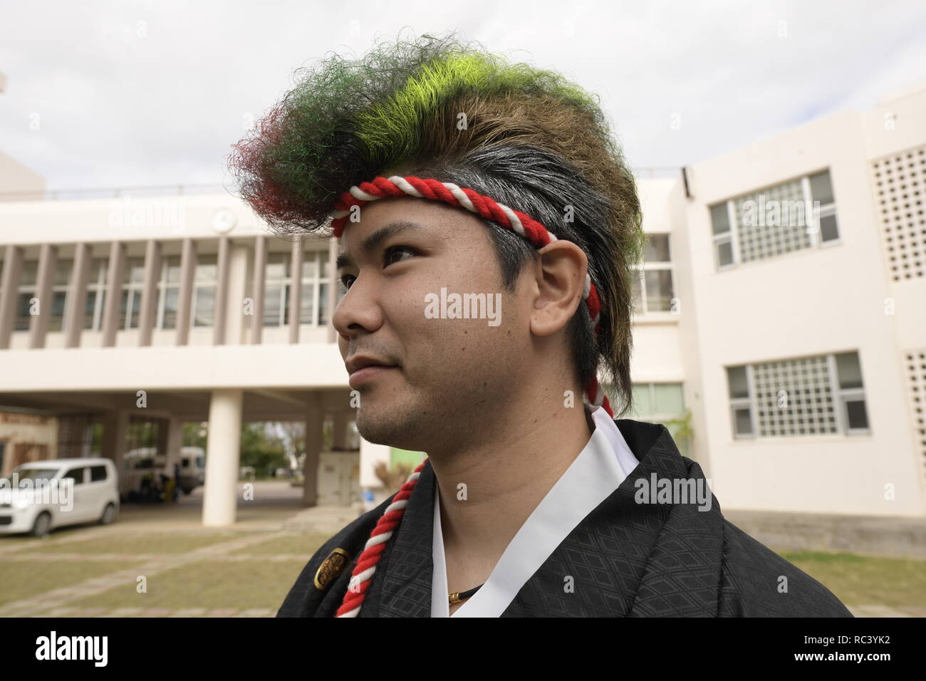 NAHA, JAPAN - JANUARY 13: An Okinawan man in a kimono poses for a ...