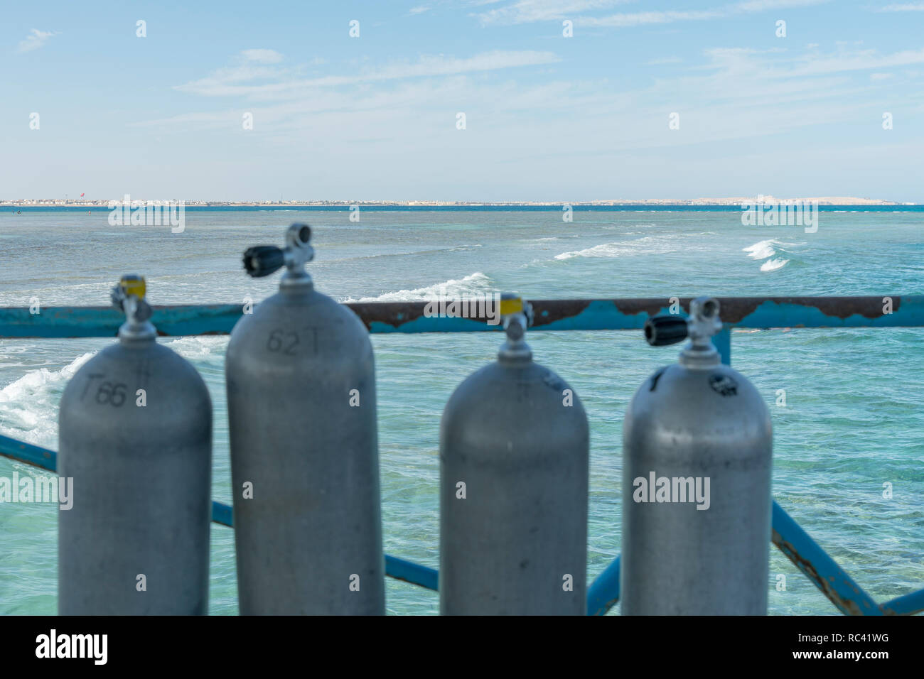 A lot of diving cylinders. oxygen cylinders outdoor. Oxygen cylinders