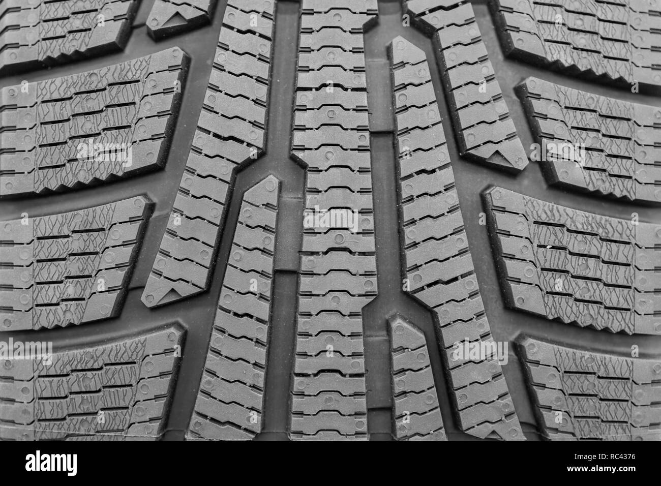 new tires for sale at booth in store. Winter Season Tire Tread. Brand