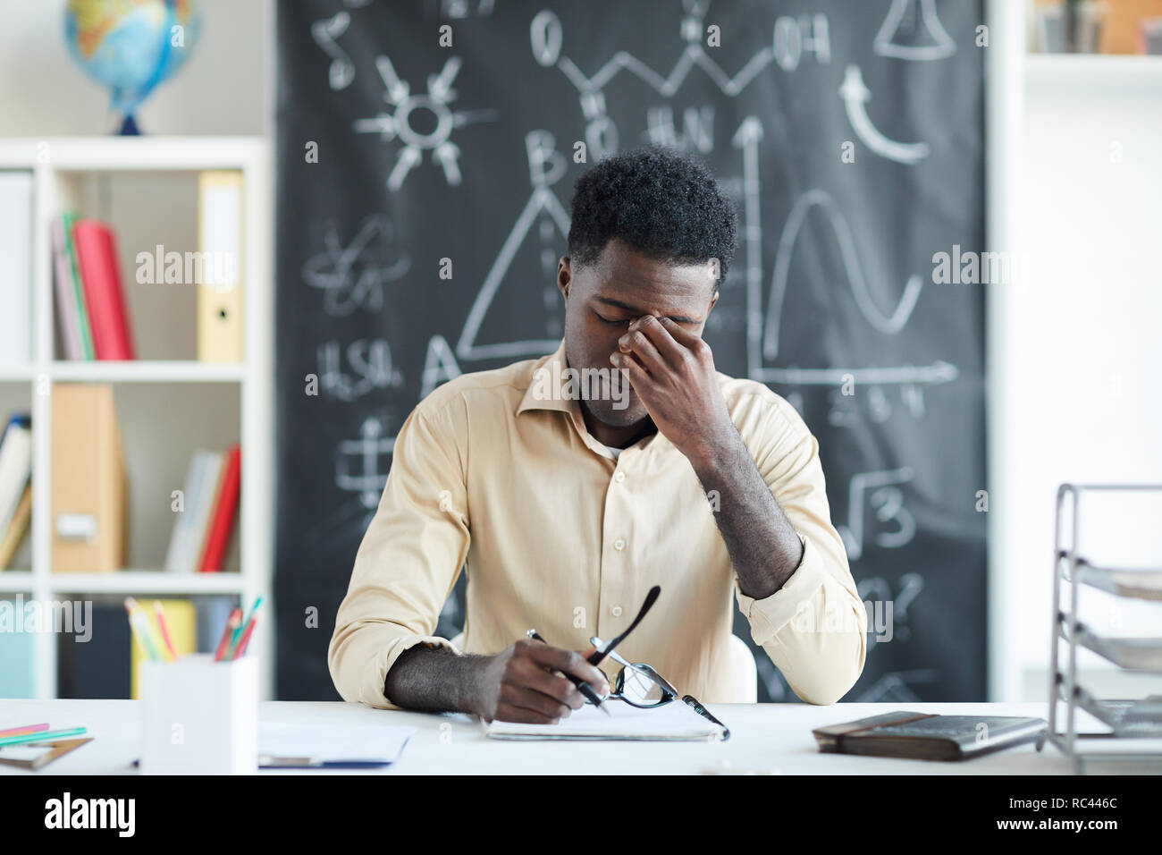 Tired teacher Stock Photo