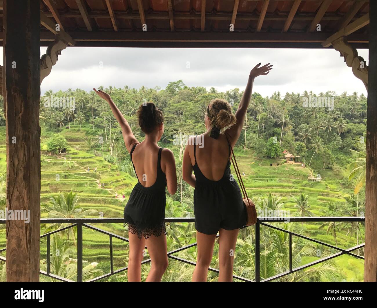 Two girls overlooking rice terraces Stock Photo