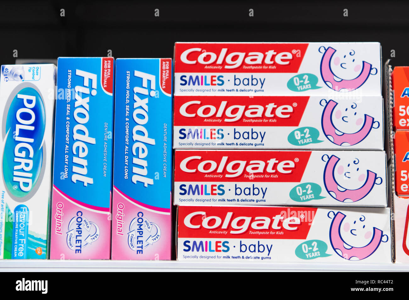 Toothpaste on sale in a supermarket shop in the UK Stock Photo Alamy