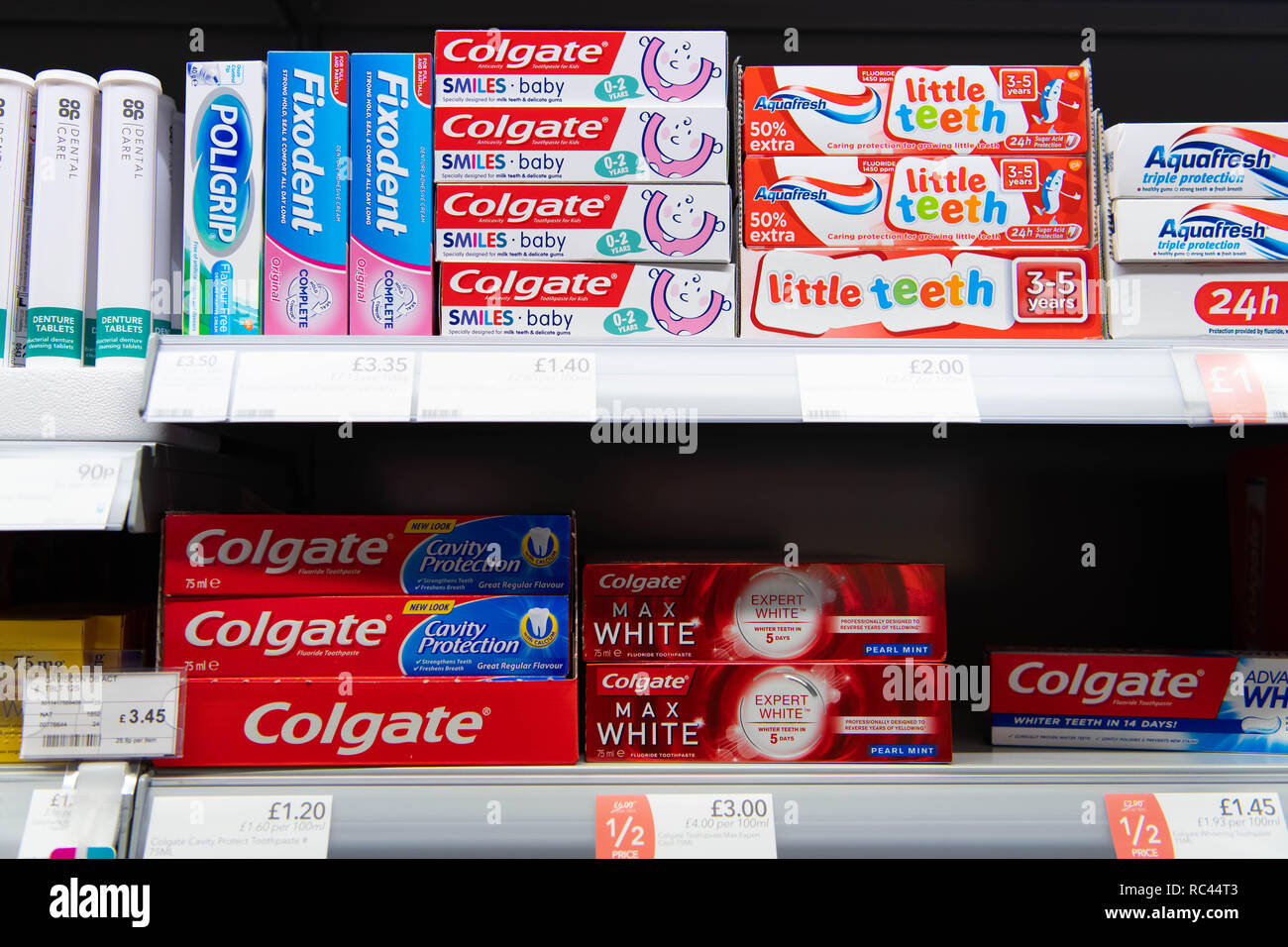 Toothpaste on sale in a supermarket shop in the UK Stock Photo Alamy