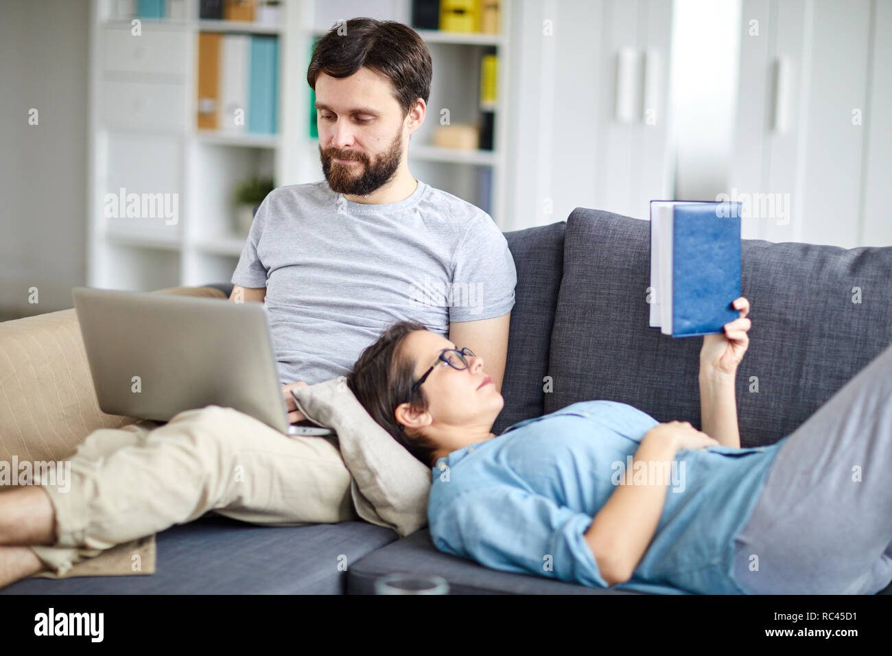 Relaxing on sofa Stock Photo Alamy