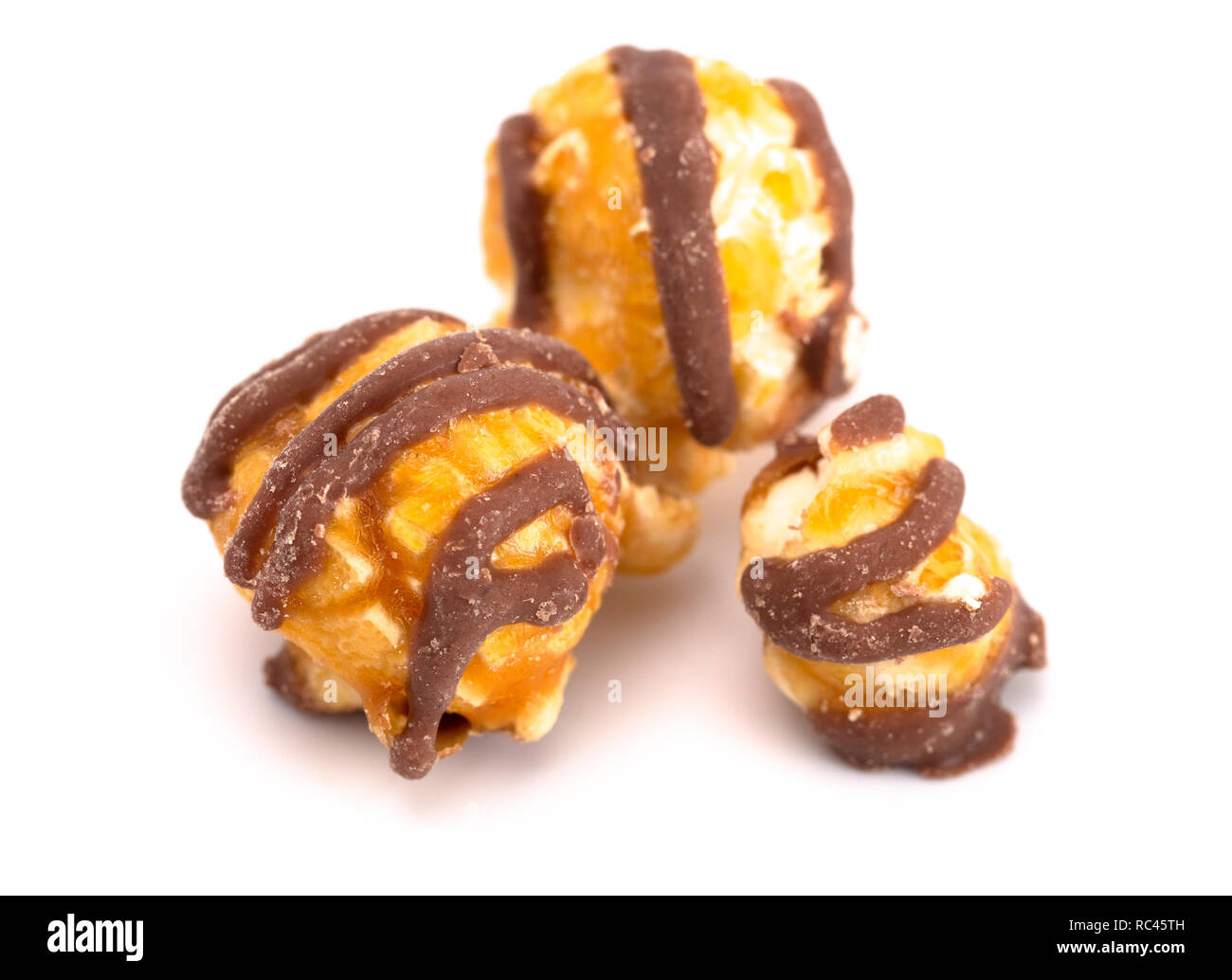 Chocolate Stripped Caramel Popcorn on a White Background Stock Photo