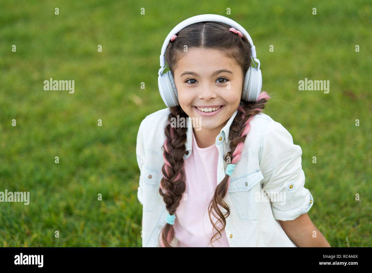 Childhood happiness. Mp3 player. small kid listen ebook, education.  childrens day. Audio technology. small girl child in headphones. Listen to  music. Beauty and fashion. Time to relax Stock Photo - Alamy