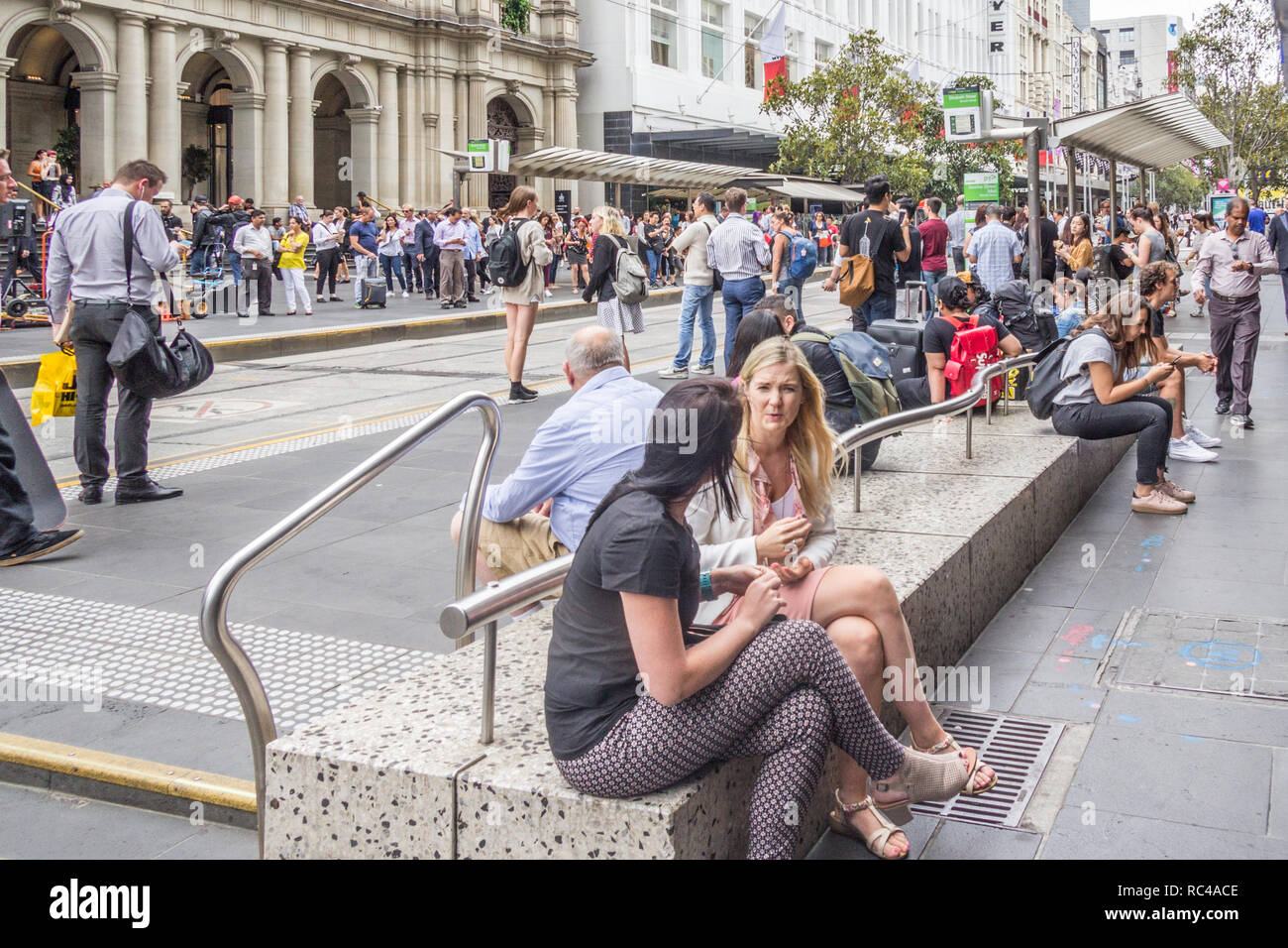 Melbourne, Australia - 21st February 2018: People on Bourke Street. The street is in the heart of the main shopping area. Stock Photo