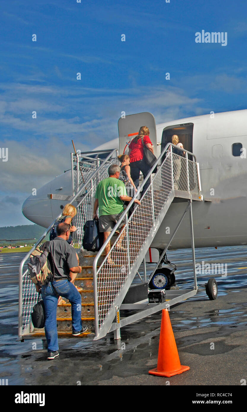 passengers boarding a 737 Boeing of Vanuatu airlines, Port Vila international airport, Efate island, Vanuatu Stock Photo