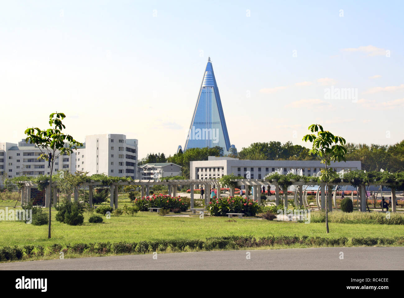 City garden and residential buildings near to Grand Monument Mansudae, Pyongyang, capital city of the DPRK, North Korea Stock Photo