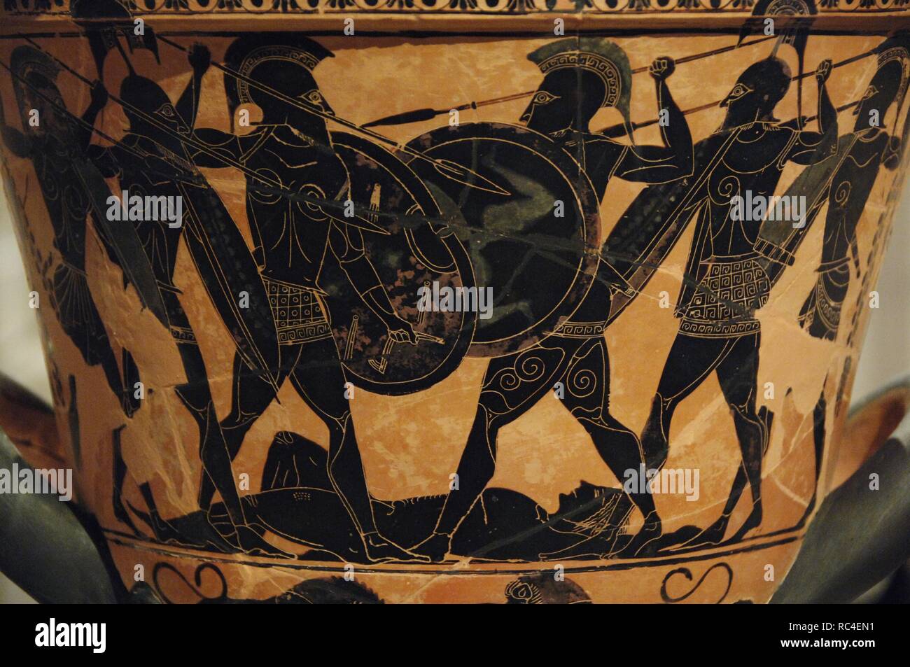 Greek art. Attic krater painted with black figures representing an Homeric battle around the body of a dead warrior (possibly Patroclus). Found at Pharsala. Dated circa 530 BCE. Detail. National Archaeological Museum. Athens. Greece. Stock Photo