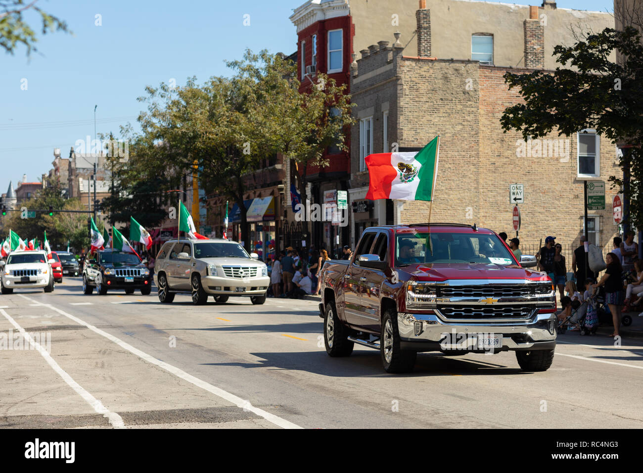 Chicago, Illinois, USA - September 15, 2018: Pilsen Mexican Independence Day Parade, Chevrolet, Silverado, with the mexican flag, going down the stree Stock Photo