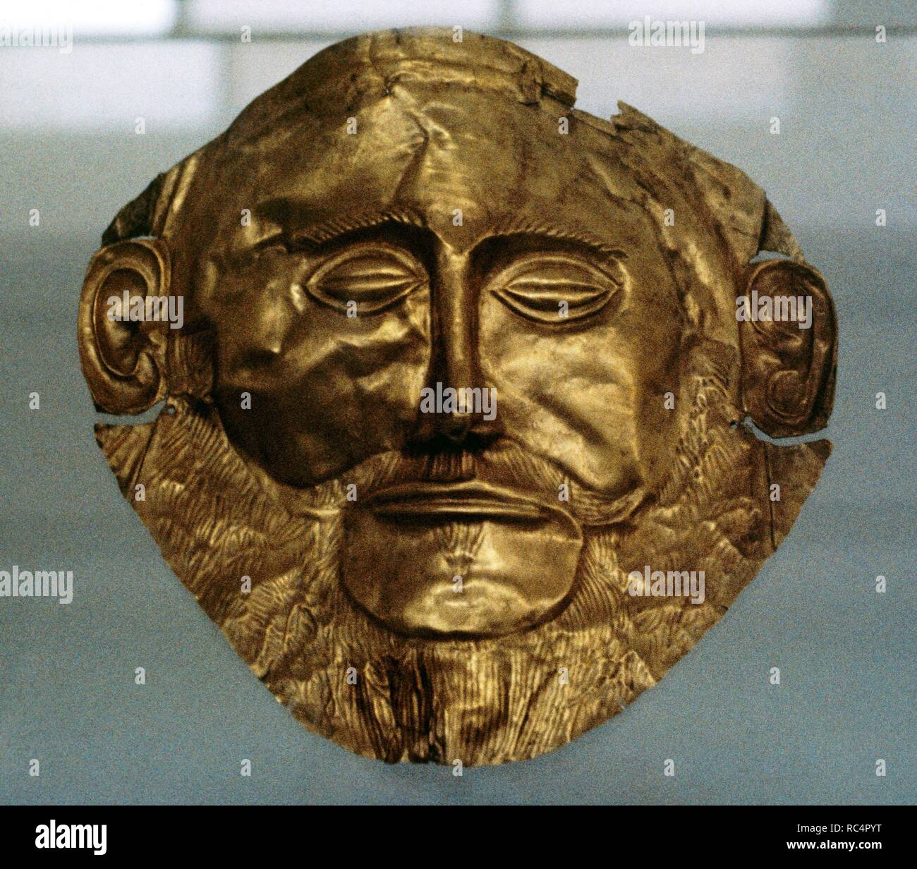Mask of Agamemnon, gold funerary mask. Mycenaean funerary mask of an unknown Myceanean ruler, 16th century BC (ca.1550 BC), found in Tomb V, Grave Circle A at Mycenae. National Archaeological Museum. Athens, Greece. Stock Photo