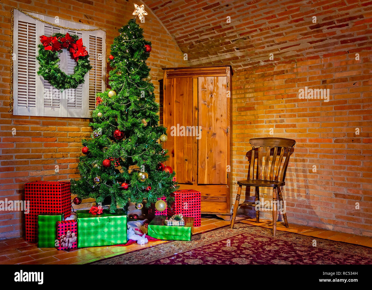A Christmas tree is set up in a room at the Fort of Colonial Mobile, Dec. 23, 2018, in Mobile, Alabama. Stock Photo