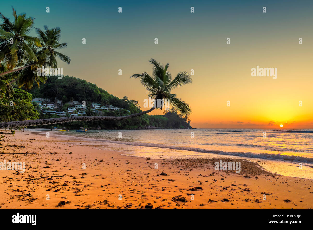 Sunset at Anse Takamaka Beach, Mahe, Seychelles. Stock Photo