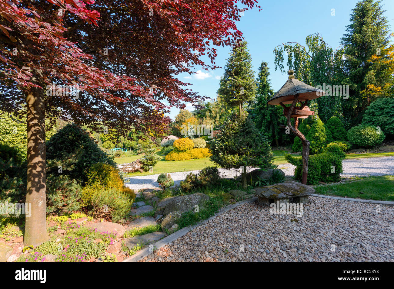 Beautiful Spring Garden In Front Bird Feeder Gardening Concept