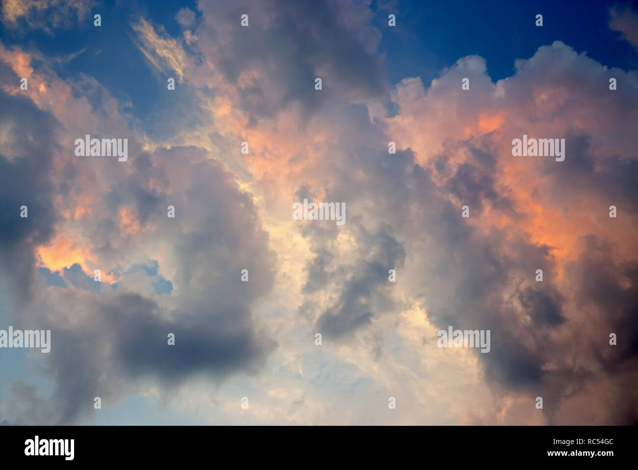 Colorful clouds on sunset sky, nature background Stock Photo - Alamy