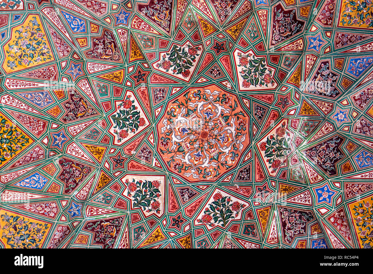 Artistic historical ceiling with colorful decorations in Wazir Khan Mosque in Lahore, Pakistan Stock Photo