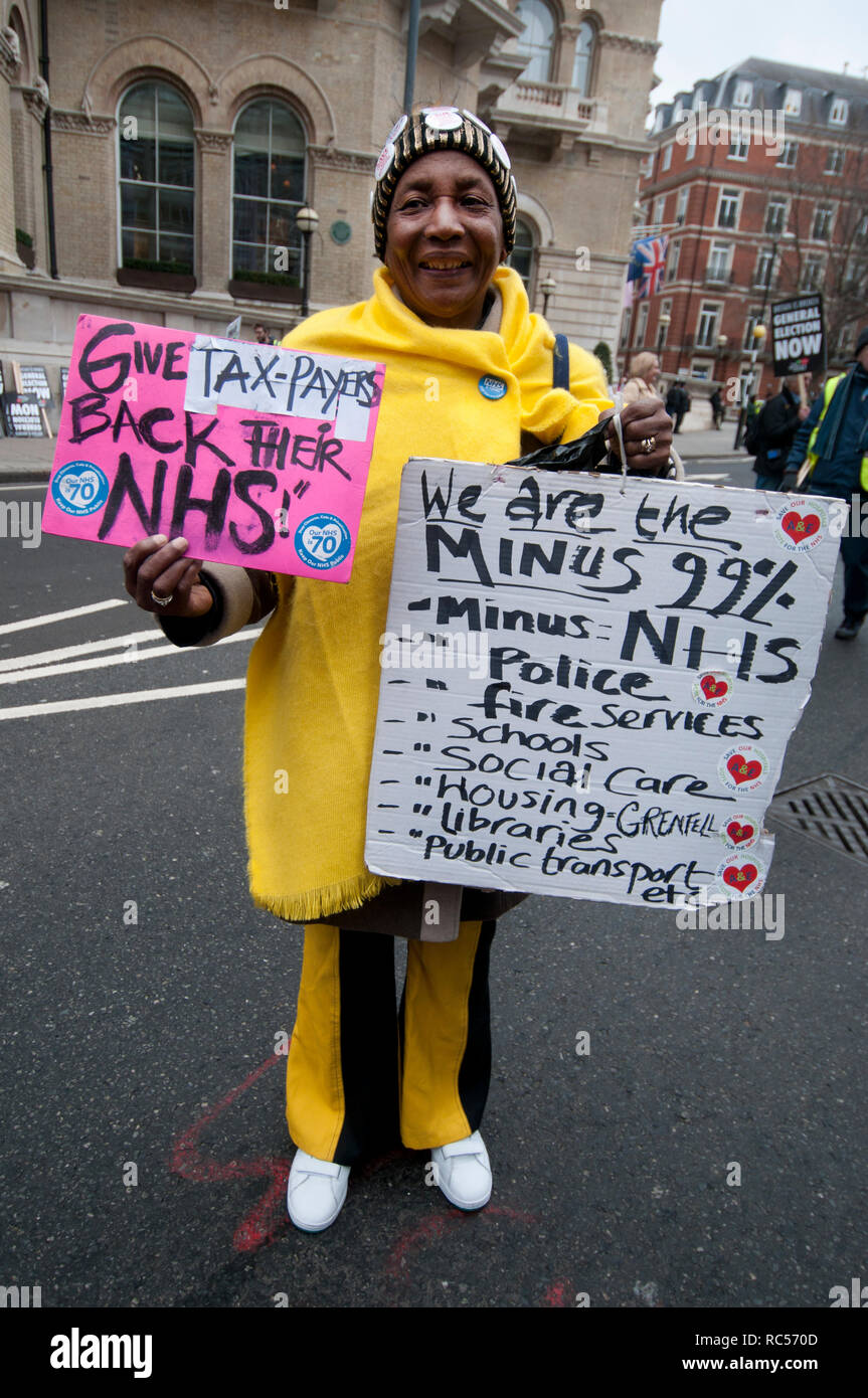 Demonstration  by People's Assembly against Austerity calling for a General Election. A veteran well dressed protester holds a placard supporting the  Stock Photo