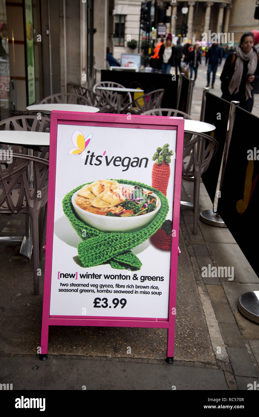 Itsu restaurant, Regent Street. A sign on the pavement advertises a vegan meal. Stock Photo