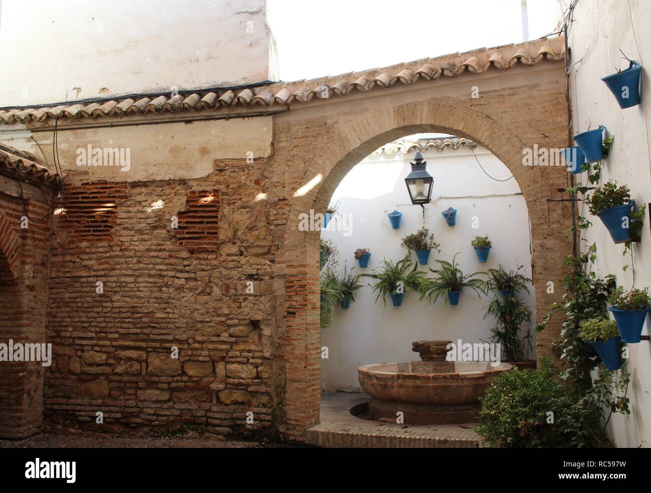 An Old Fashioned Spanish Garden In An Old Building In The Old Town