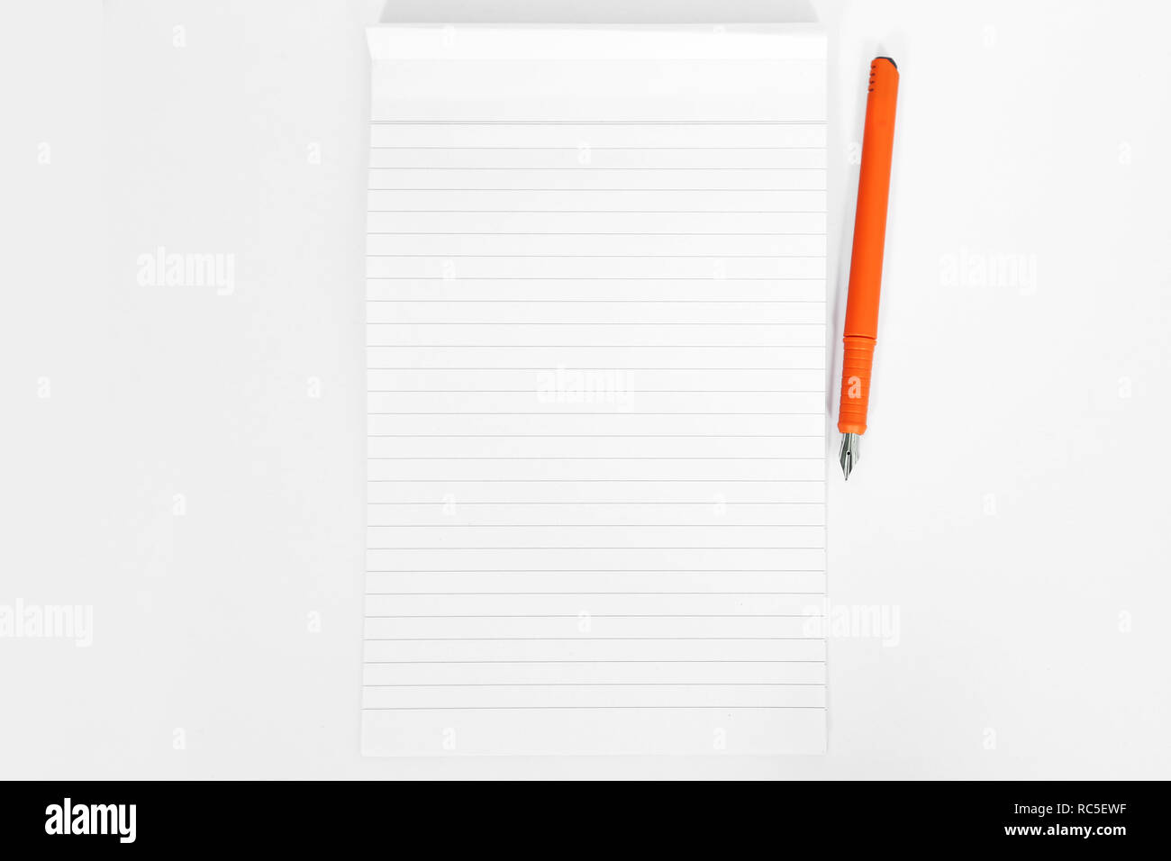Empty notebook with pen. Isolated on the white background. Stock Photo
