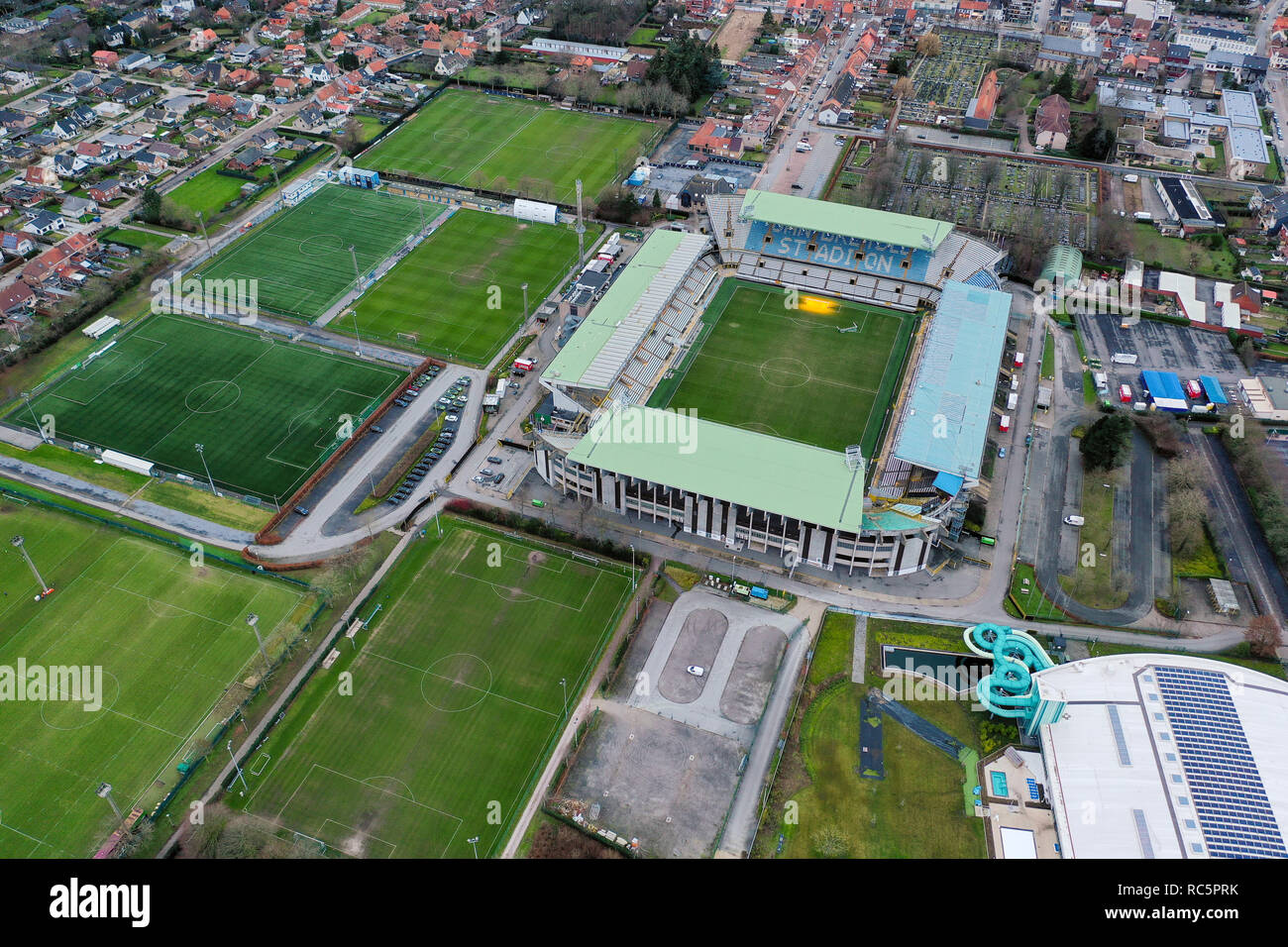 JANUARY 5, 2019, Bruges, Belgium: Jan Breydel Stadium aerial view is home for Club Brugge and Cercle Brugge soccer clubs ft. flying urban neighborhood Stock Photo