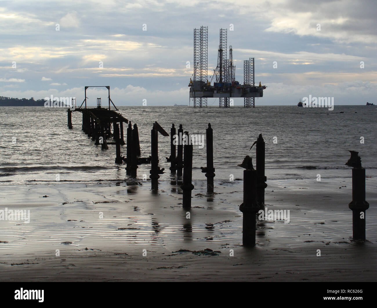 Limbe / Cameroon - October 13 2009: The oil platform as seen from the city beach of Limbe, Cameroon. Stock Photo