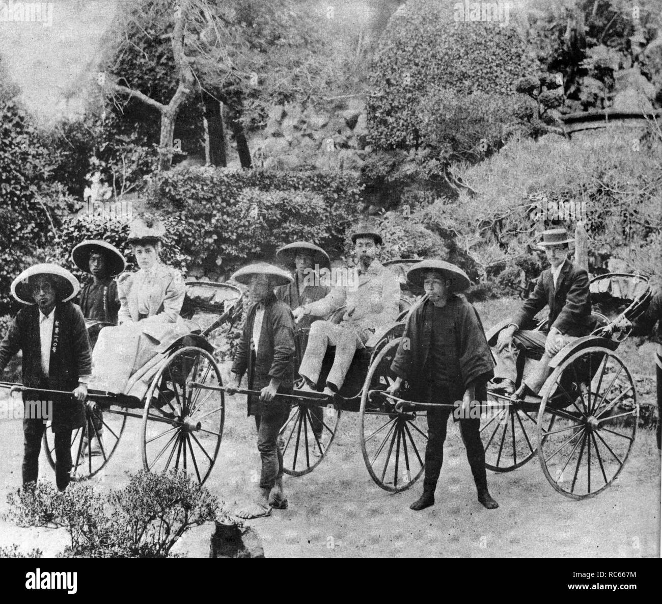Winston Churchill's father, Lord Randolph Churchill and his mother, Lady Churchill, travelling in rickshaws in Japan. Stock Photo