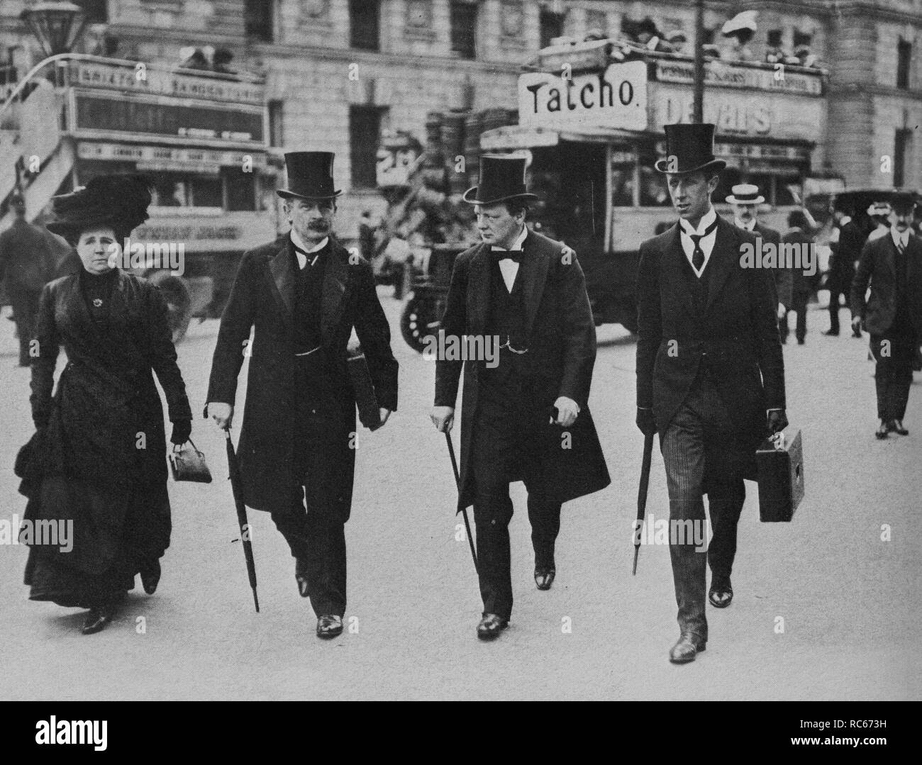 Mr & Mrs LLloyd George, Winston Churchill and Lloyd George's Secretary, William Clarke on their way to the House of Commons for the budget.27/5/1910 Stock Photo