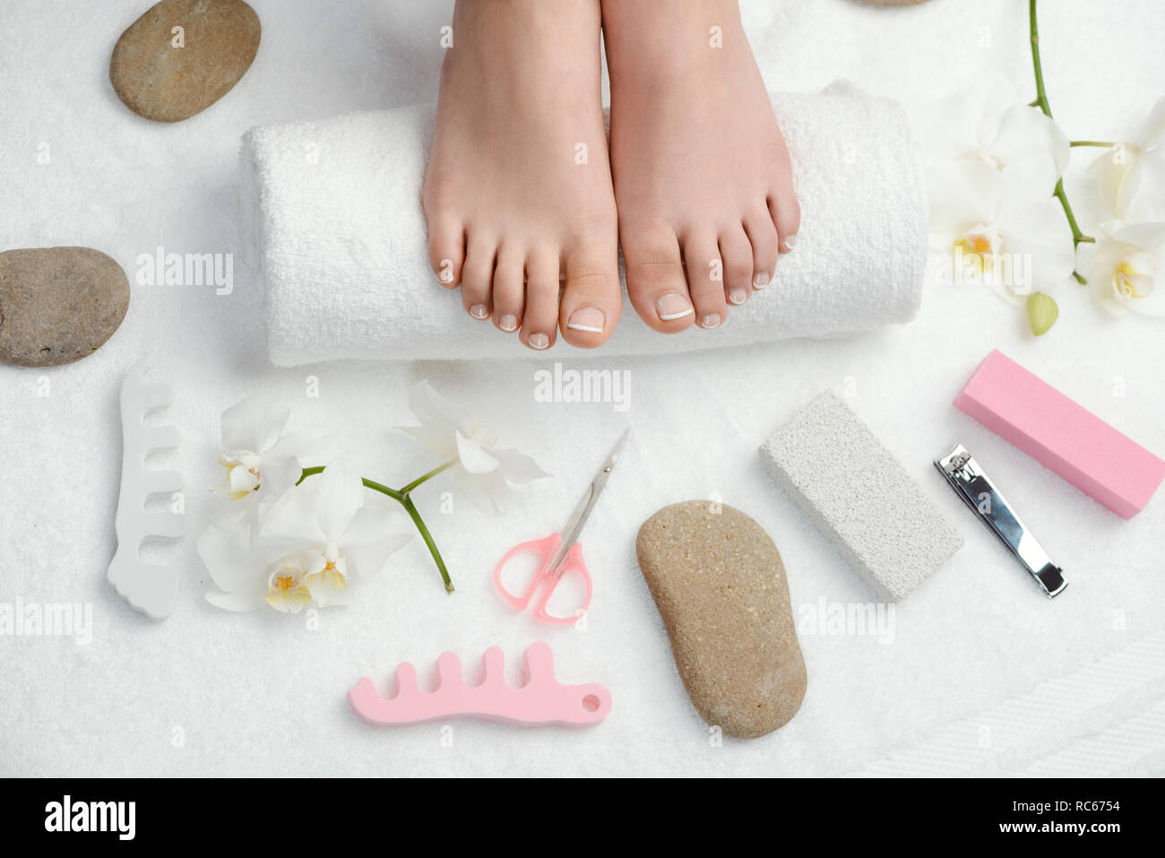 Groomed feet and toe nails Stock Photo
