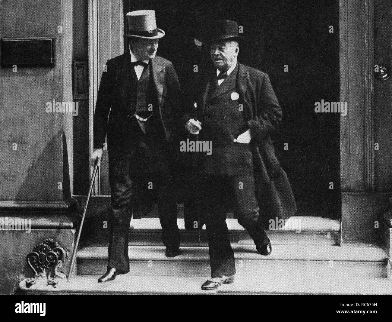 Winston Churchill and Lord Fisher leaving a meeting of the Committee of Imperial Defence. 1913 Stock Photo