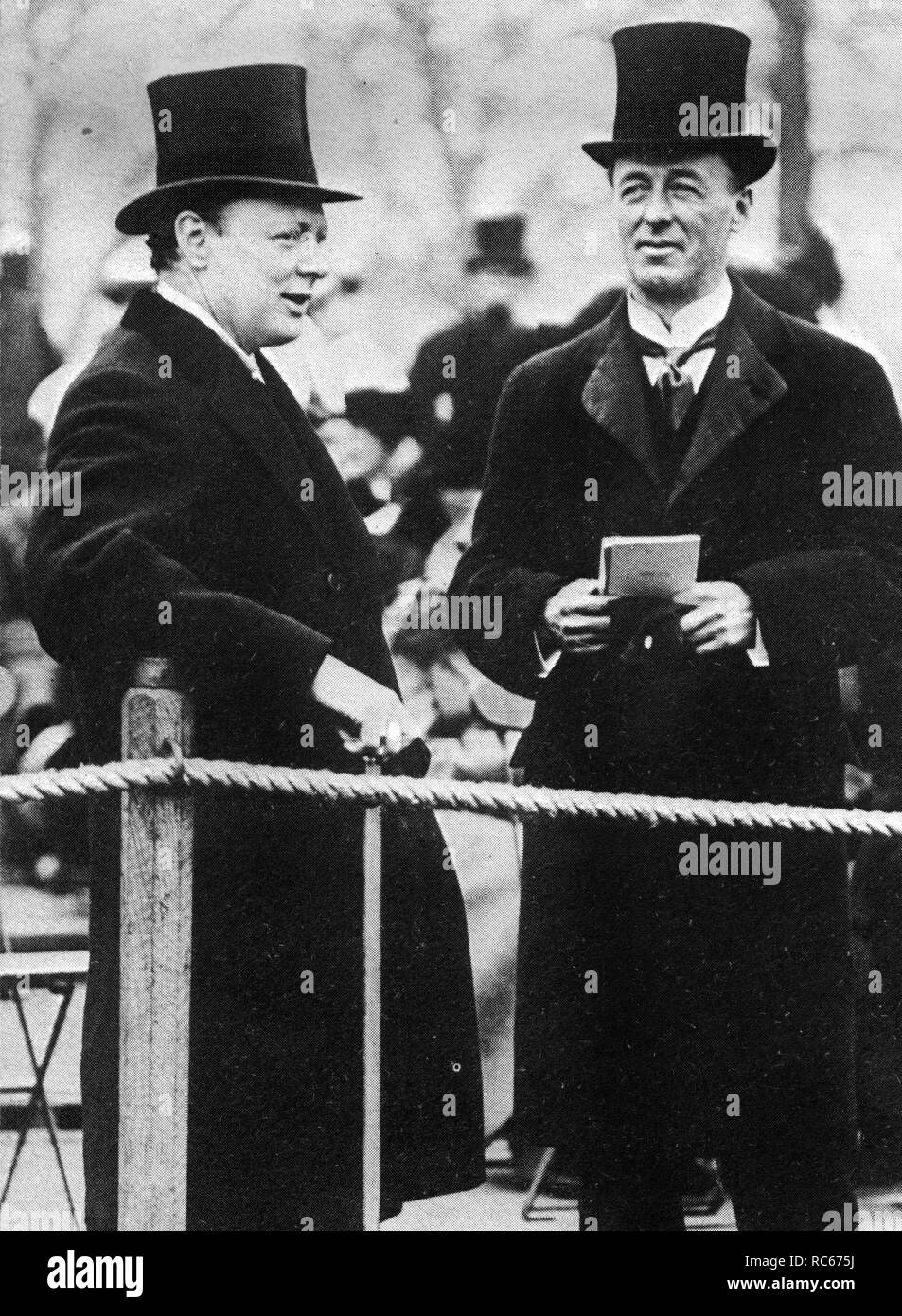 Winston Churchill with friend Jack Seely,Secretary of State for War watching the Review of the Brigade of Guards in Hyde Park, 28 April 1913 Stock Photo