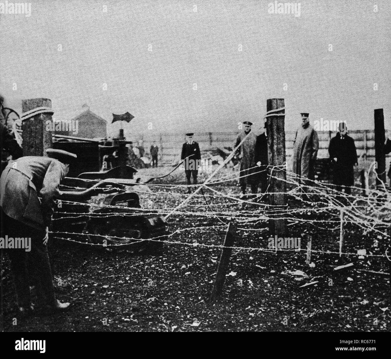 Winston Churchill observes barbed wire cutting demo at Wormwood Scrubs.June 1915 Stock Photo