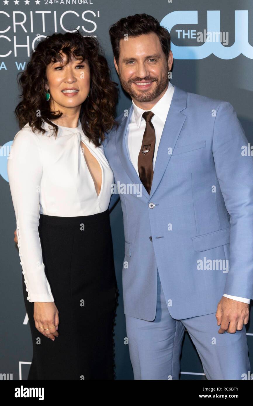 Celebrities sandra oh and edgar ramirez hi-res stock photography and